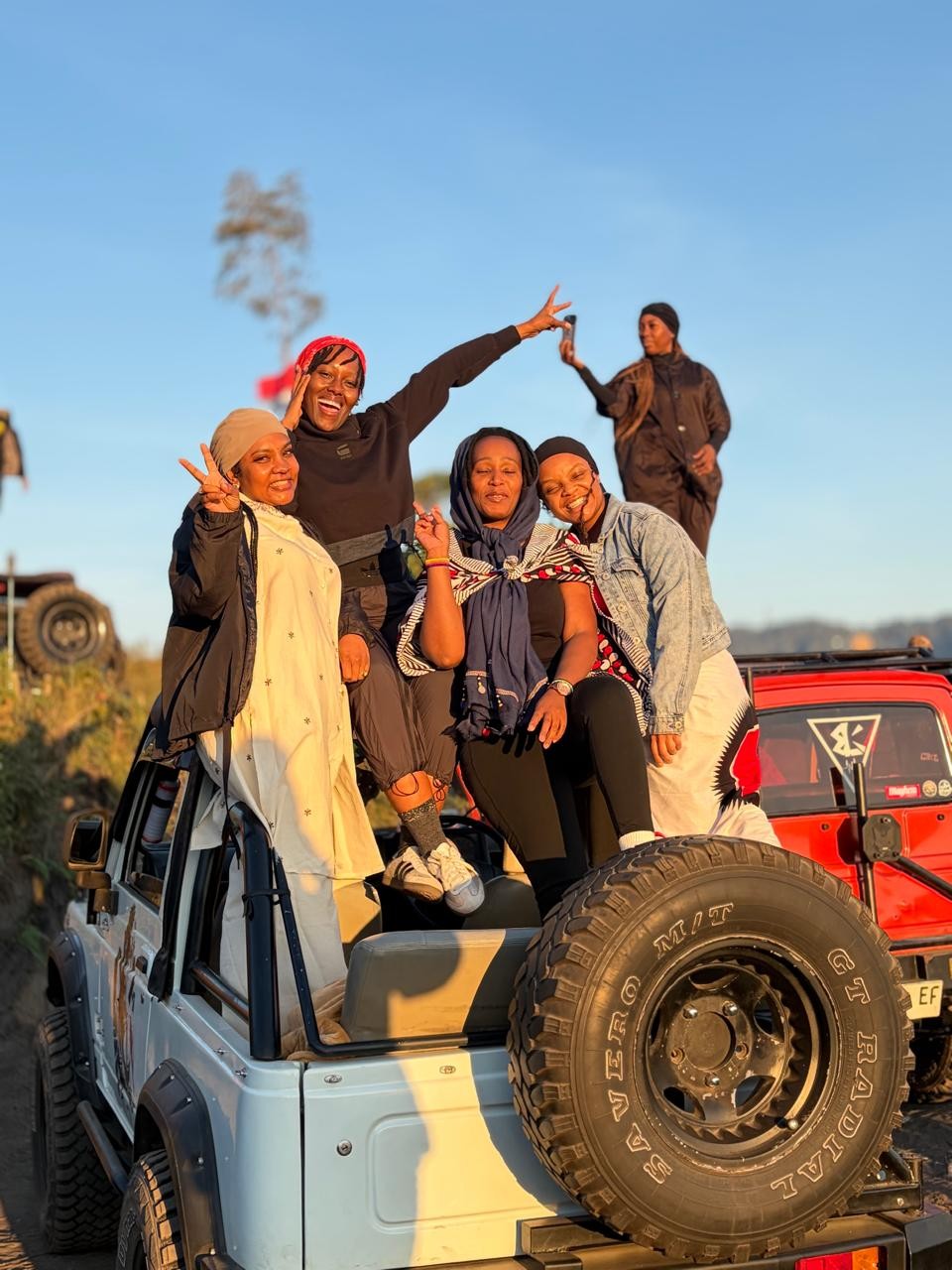 GoMo travellers enjoying an outdoor vehicle adventure